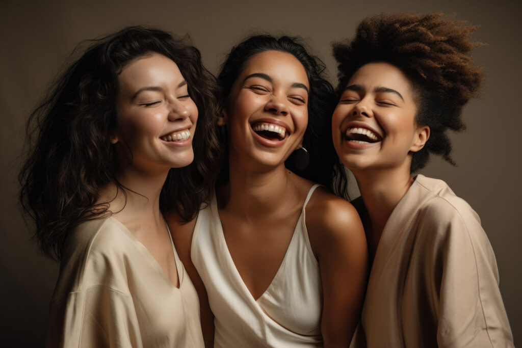 Three girls laughing