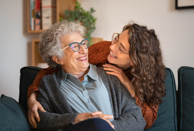 mother and daughter laughing