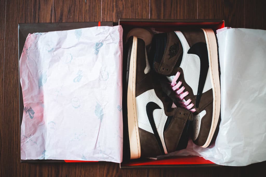 a pair of sneakers in a package
