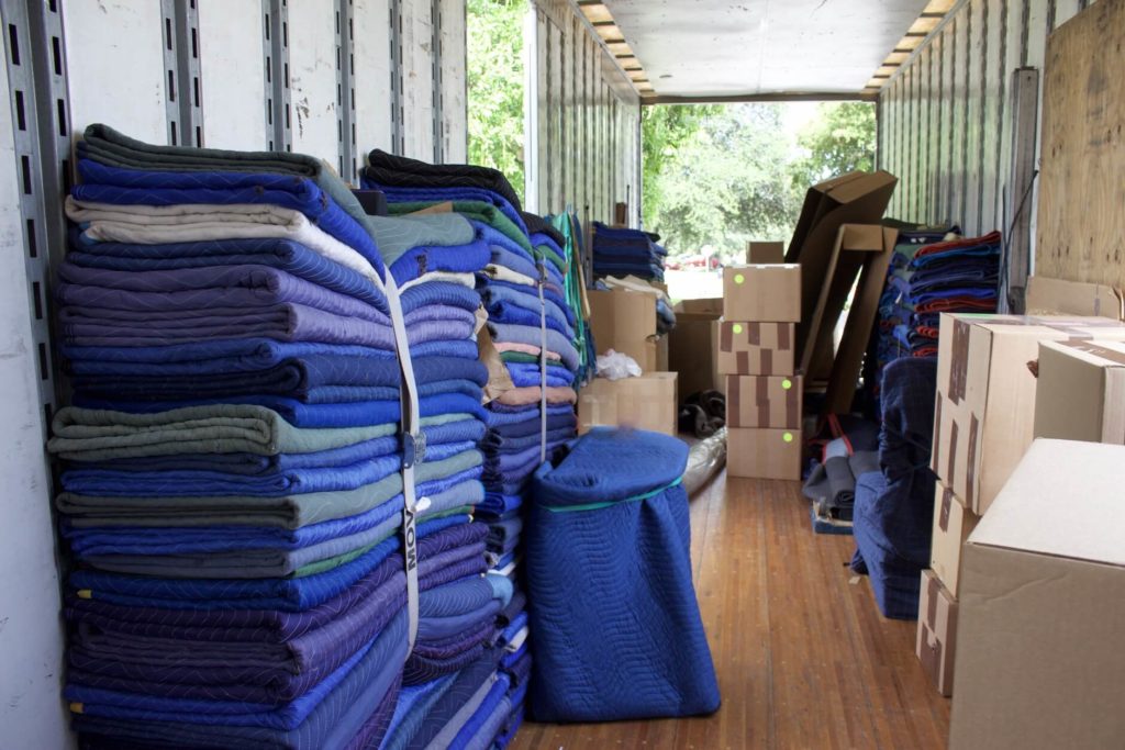 Storage with moving blankets and other materials state to state movers use for the packing process 