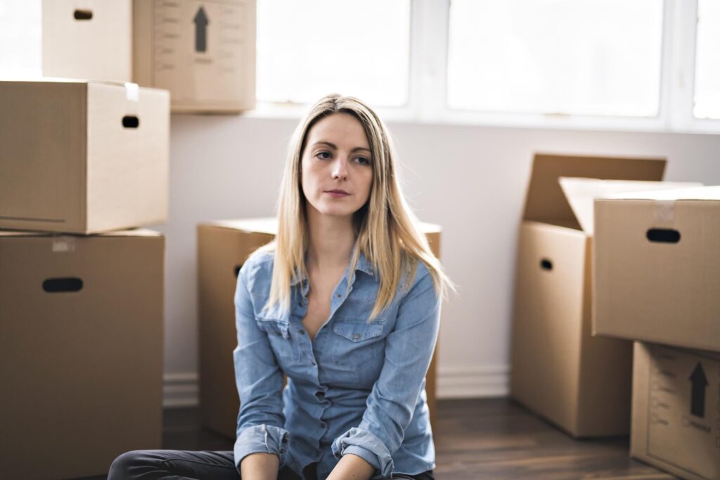 woman thinking about her decision to move