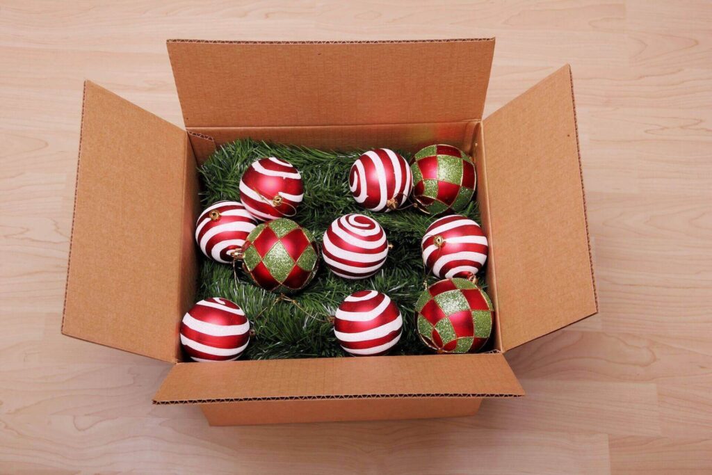 Christmas decorations packed in a box before moving interstate