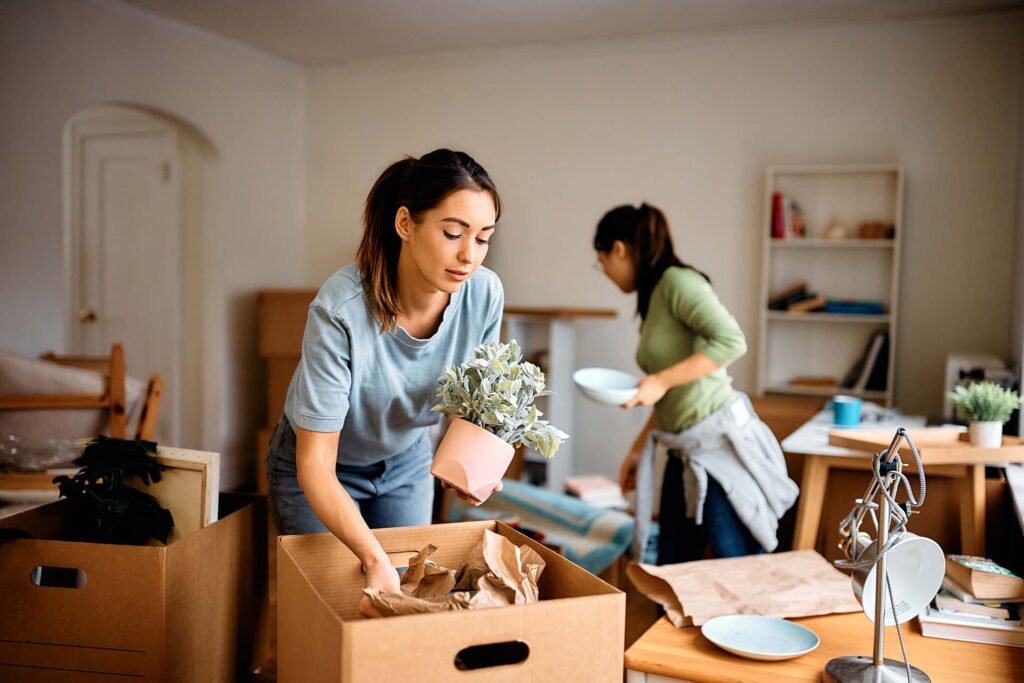 Women unpacking after a move